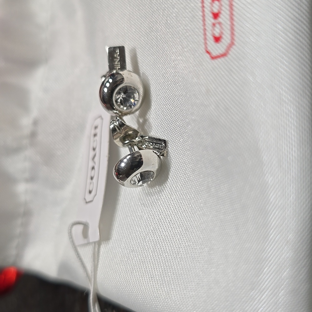 Coach pierced earrings New with tags